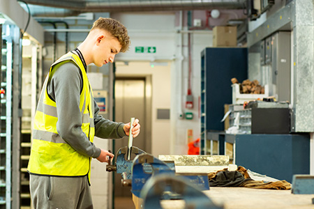 Student working in the workshop